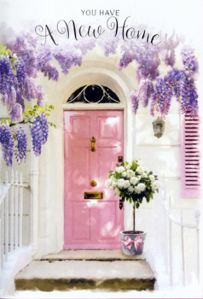 This Collier Row doorway feels like a tender snapshot of a life milestone, captured in flowers and soft colour. At the centre stands a pastel pink door, painted in a gentle, almost chalky hue that seems to hold the light, giving the entire front a warm, welcoming glow. A matching shutter and a smooth, whitewashed wall flank the door, simply rendered so that the eye is drawn towards the floral details. Overhead, cascades of lavender wisteria tumble downward in loose, elegant arcs. Each strand is densely packed with tiny lilac and violet buds, the kind of abundant, fragrant bloom that reminds you of spring gardens tucked behind homes near Collier Row Lane. The wisteria drapes like a natural garland, framing the entrance with an air of romance and celebration. Sitting proudly on the doorstep, a grey metal bucket acts as a rustic vase for a lavish arrangement of white and cream roses. The roses are plush and full, their petals soft and velvety, opening from tight buds into rounded, layered blossoms that look almost cloud-like against the neutral metal. Threads of green foliage weave between them, bringing a hint of woodland freshness and adding movement and depth to the composition. Around the base of the bucket, a blush-pink satin ribbon is tied with care, its bow and trailing ends catching the light, subtly echoing the door's gentle hue. The overall atmosphere is one of calm anticipation and heartfelt congratulations: a floral doorway greeting perfectly suited for a housewarming delivery in Collier Row, expressing pride, hope, and the sweet nervousness of stepping into a new home for the very first time.